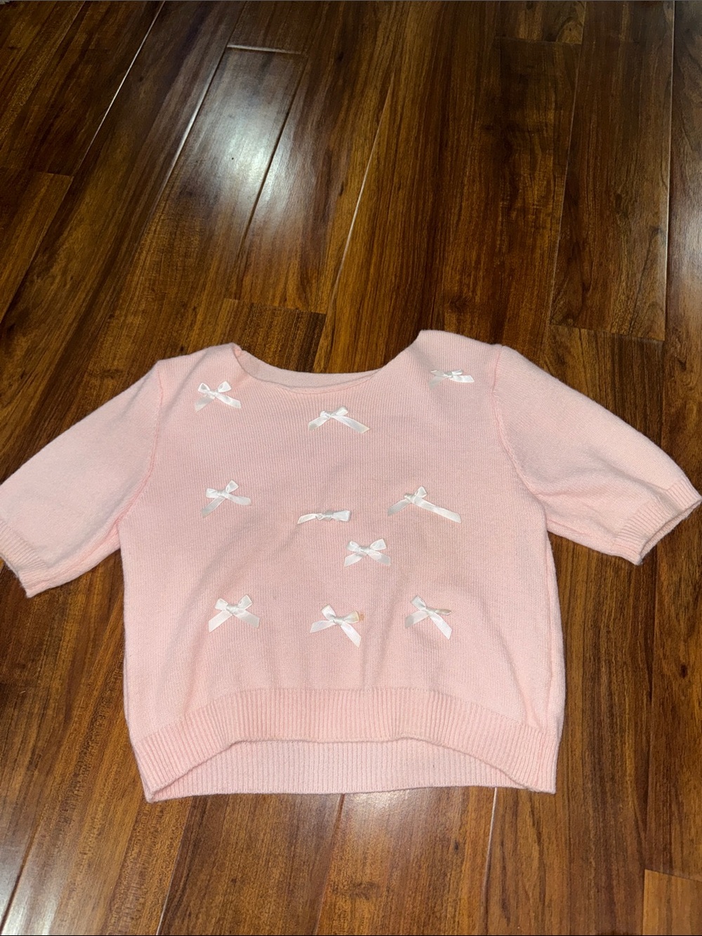 Pink Knit Top with Bow Accents